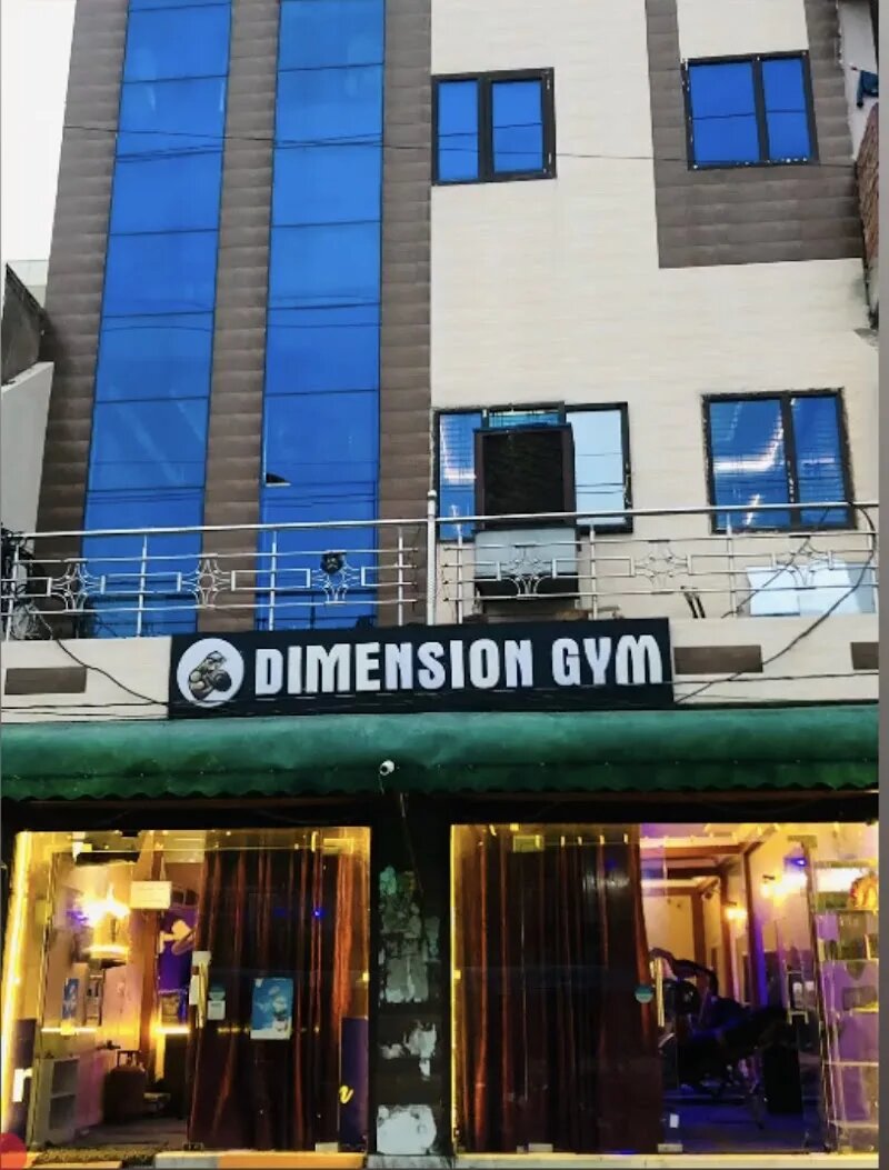 Street front with the DIMENSION GYM signboard